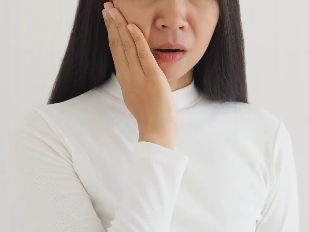 person dealing with tmj pain