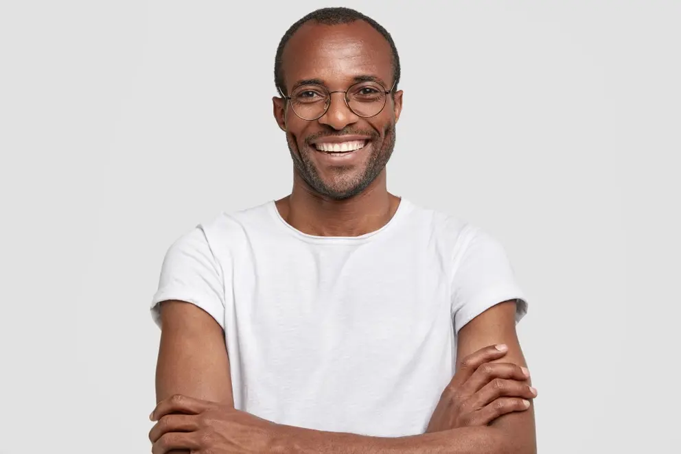 smiling male orthodontic patient
